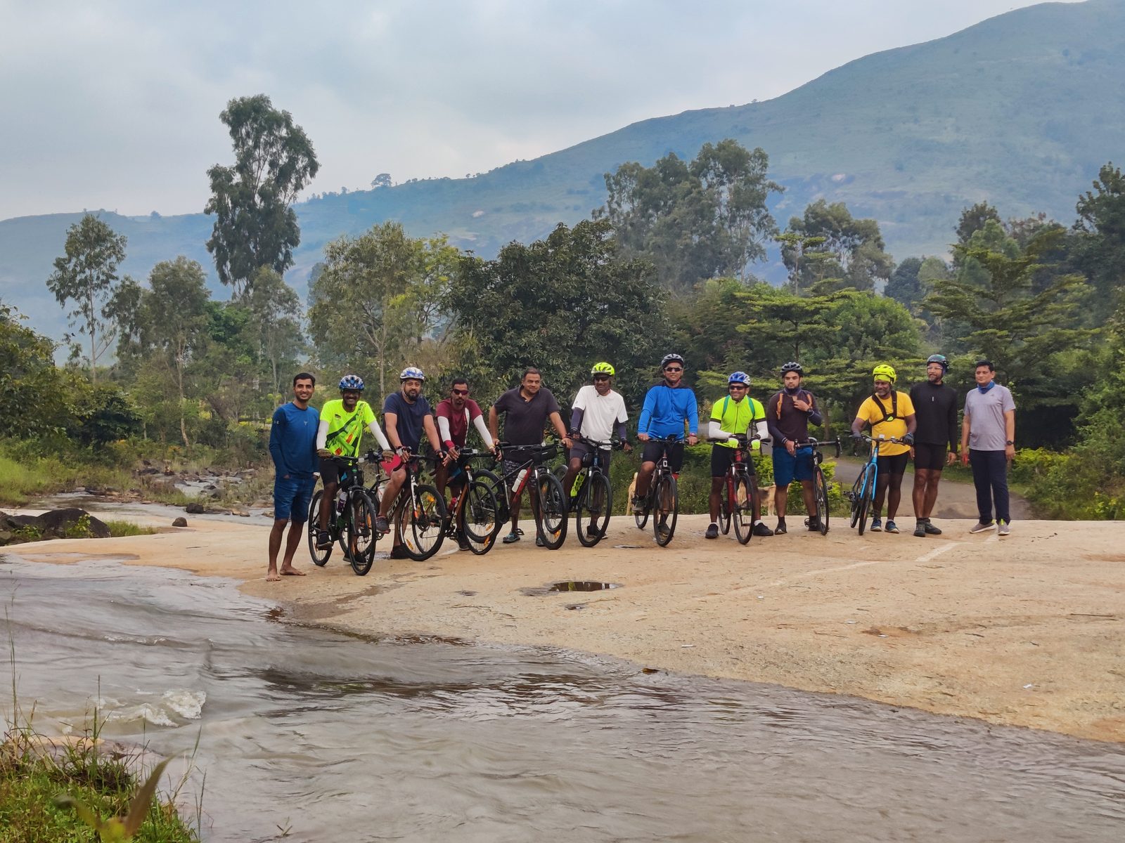 Group of cyclists at a riverbed