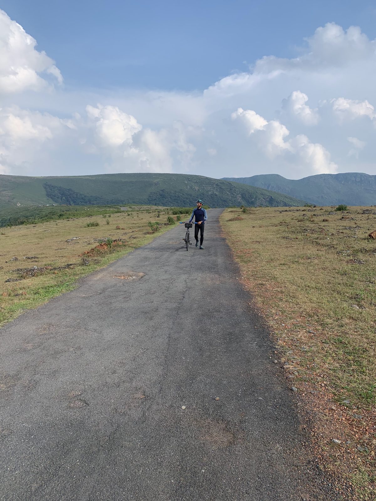 Cyclist on a hill road in the Eastern Ghats