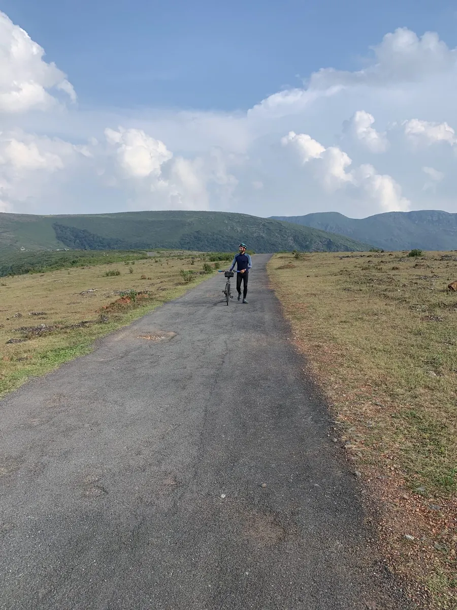 Cyclist on a hill road in the Eastern Ghats